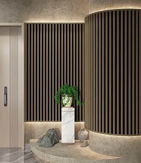 Pare slat wall panel and curved partition installed in a lobby