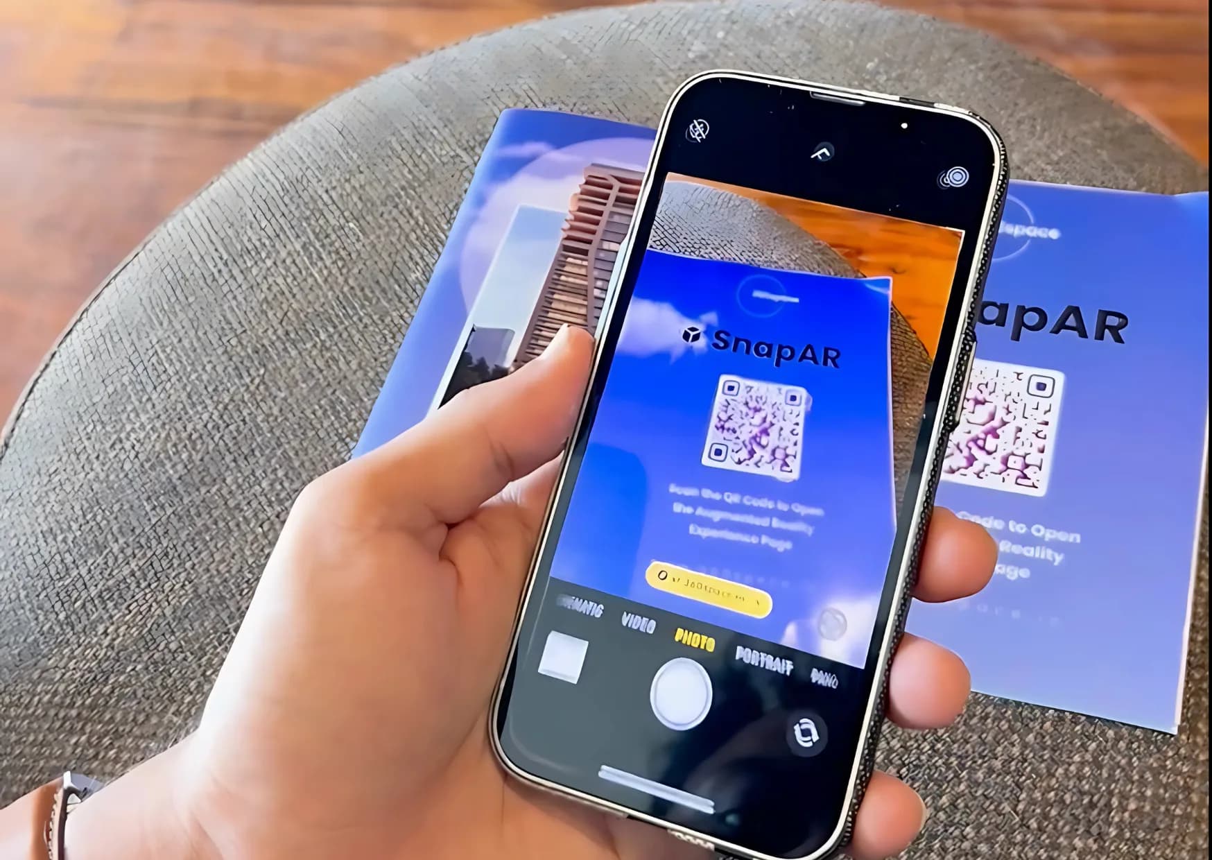 Scanning a QR code on a real estate print ad